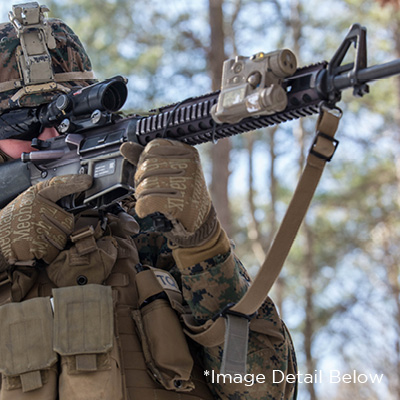 Rifleman in Marine Regiment, sights his M16A4 / M16A2 while on patrol