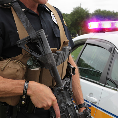 Police Officer with Kryptek Push Button Sling on AR 15